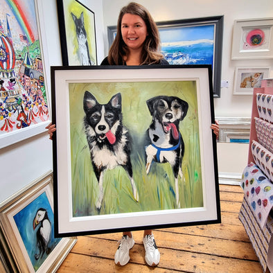 Artist Dawn Crothers with her recent dog commission painted in oil of two collies